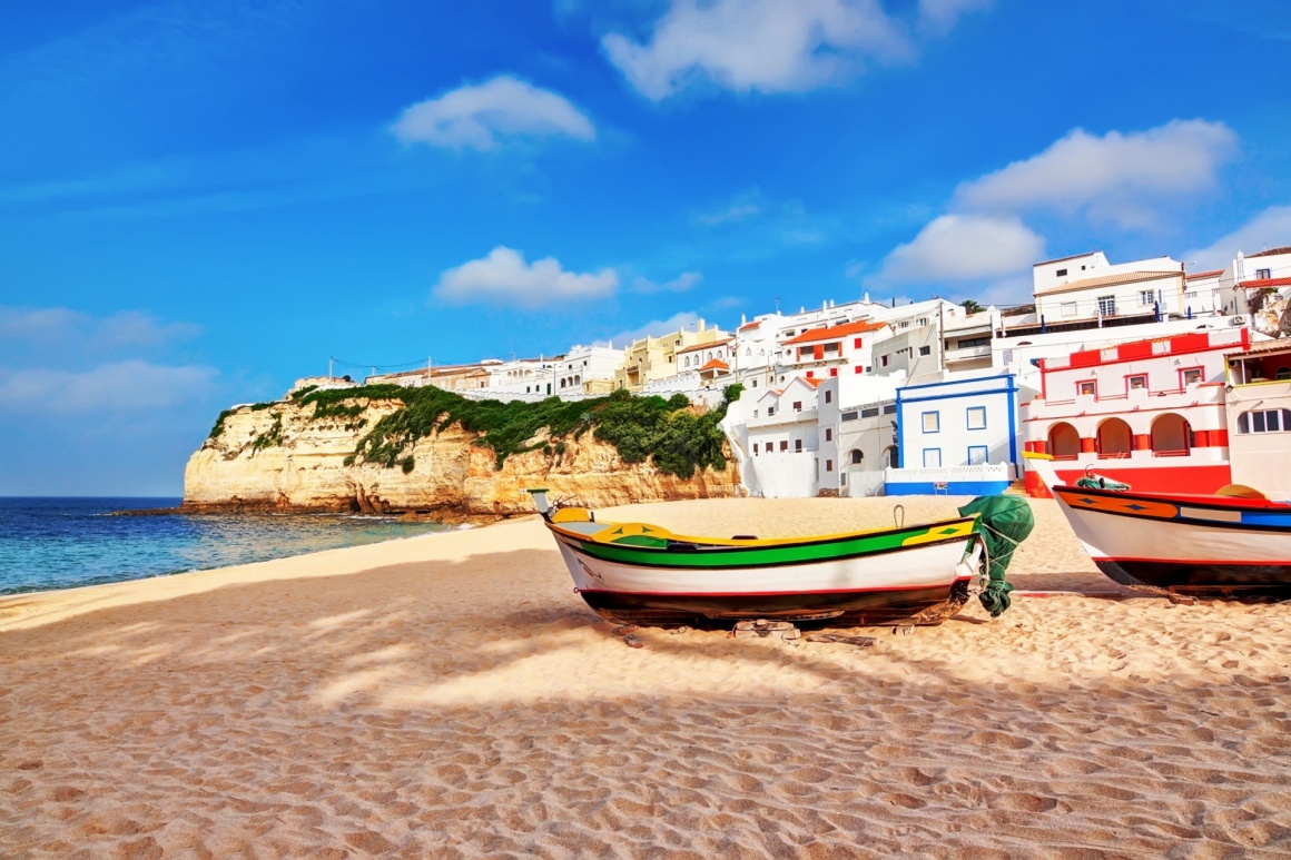 'Portuguese beach villa in Carvoeiro classic fishing boats. Summer.' - Algarve